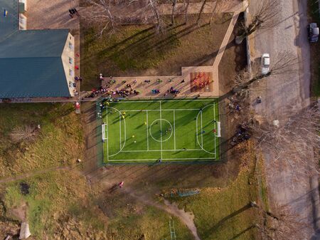 Green football stadium field. Aerial top view.の写真素材