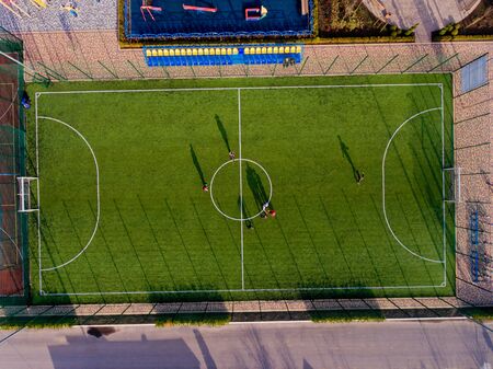 Green football stadium field. Aerial top view.の写真素材