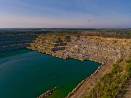 The quarry after the mining of minerals is filled with water. Aerial view.の写真素材