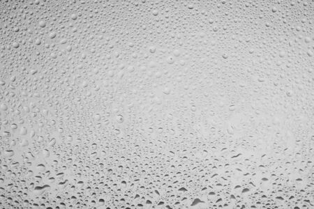 White water drops on glass. Background.の写真素材