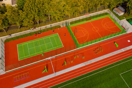 Sports ground top view. Aerial view of tennis and basketball court. Sports ground.の写真素材