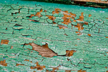 Old green board with cracks. Selective focus.の写真素材