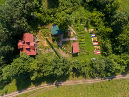 Top view of camp of tourists with tents on the river bank.の写真素材