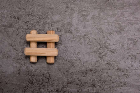 View of a grouping of wooden dowels on gray background. close-up. selective focus.の写真素材
