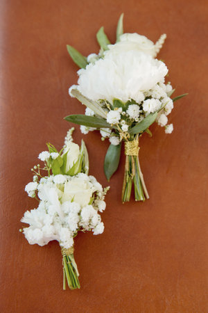 Men's wedding boutonnieres close-up. Set groom accessories. selective focus.