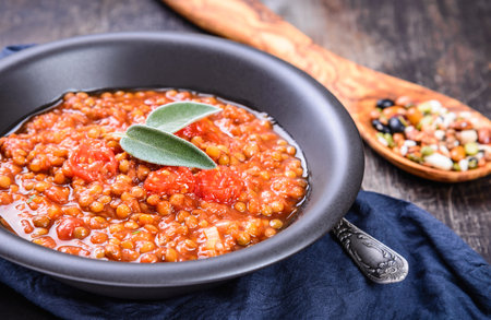 Legumes stew.Lentils soup with tomatoes.の写真素材