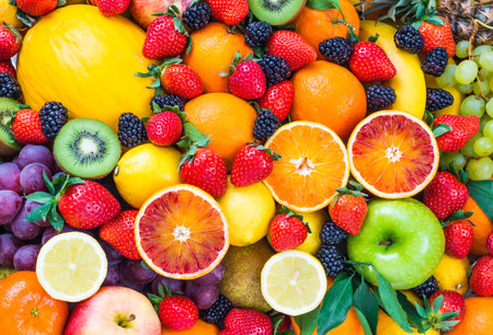 Assorted fruits colorful background.の写真素材