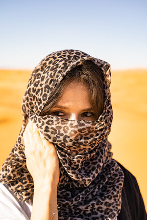 a girl in the Sahara desert in North Africaの写真素材