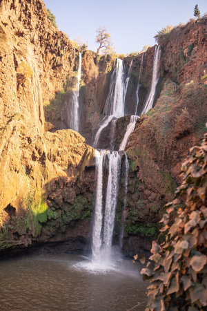 waterfall in the mountains of North Africa in the setting sunの写真素材