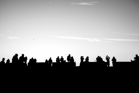shadows on the background of the sunset over the oceanの写真素材