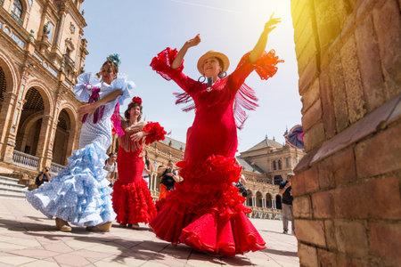 SEVILLE, SPAIN - MAY 2017: Young women dance flamenco on Plaza de Espanaのeditorial素材