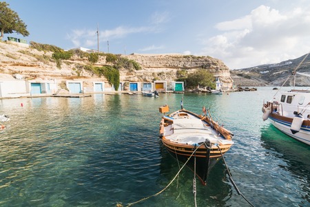 MANDRAKIA, GREECE - MAY 2018: Boats Moored in the Village Harbourのeditorial素材