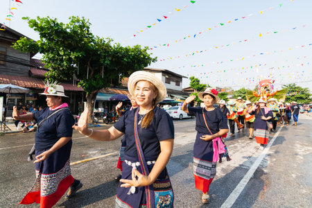 SUKHOTHAI, THAILAND - 13 APRIL 2019: Thai people celebrating New Year Songkran Water Festival on the street.のeditorial素材