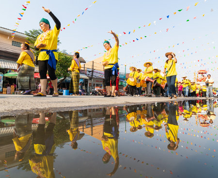 SUKHOTHAI, THAILAND - 13 APRIL 2019: Thai people celebrating New Year Songkran Water Festival on the street.のeditorial素材