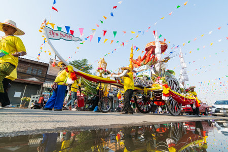 SUKHOTHAI, THAILAND - 13 APRIL 2019: Thai people celebrating New Year Songkran Water Festival on the street.のeditorial素材