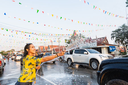 SUKHOTHAI, THAILAND - 13 APRIL 2019: Thai people celebrating New Year Songkran Water Festival on the street.のeditorial素材