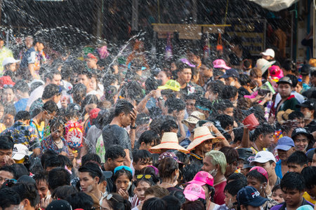 SUKHOTHAI, THAILAND - 15 APRIL 2019: Thai people celebrating New Year Songkran Water Festival on the streetのeditorial素材