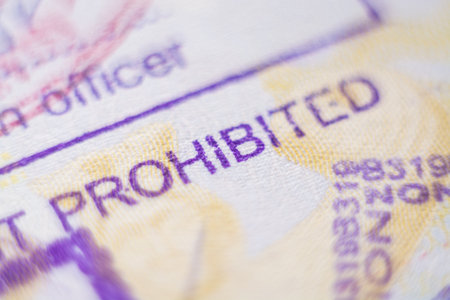 Kyiv, Ukraine - November 2019: close up of customs stamp with the word Prohibited in focusのeditorial素材