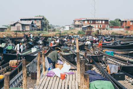 Maing Thauk, Myanmar - April 2019: people at traditional Burmese floating market on waters of Inle lake.のeditorial素材