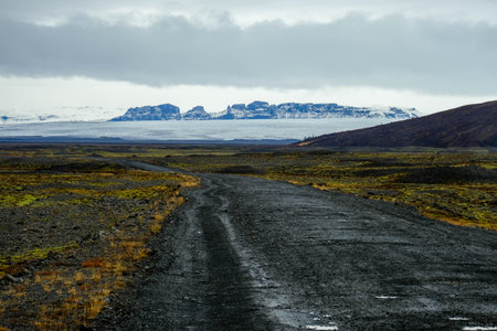 Rural road in icenad with mountiain landscape view