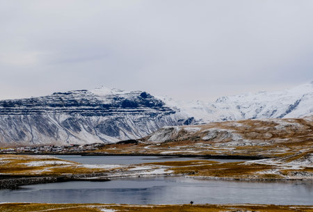 snow mountain with big lake in west iceland beautiful background landscapeの写真素材