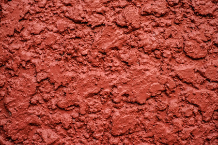 Close up red cement wall  texture background outdoor