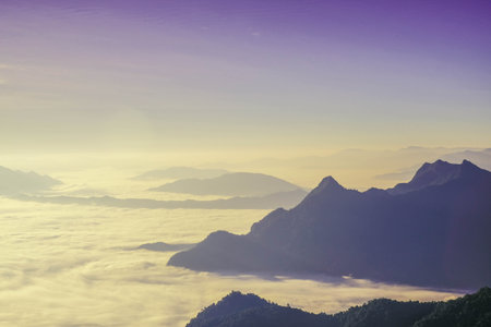 mountain view in morning with sea fog  and sunrise