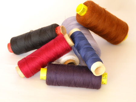 yarn bobbins of different colours