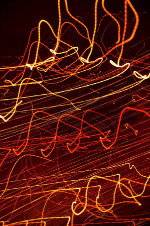 Picture of red random abstract light trails.