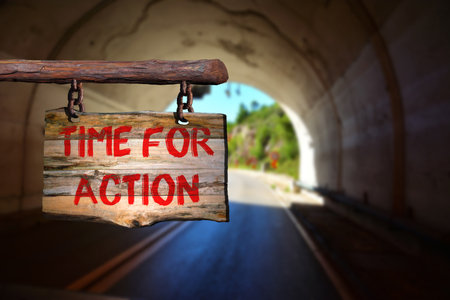 Time for action sign with blurred backgroundの写真素材
