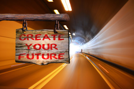 Create your future motivational phrase sign on old wood with blurred backgroundの写真素材