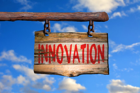 Innovation motivational phrase sign on old wood with blurred backgroundの写真素材