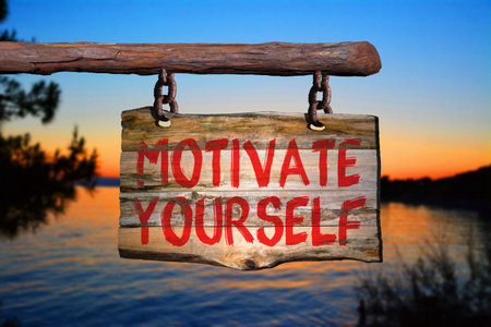motivate yourself motivational phrase sign on old wood with blurred backgroundの写真素材