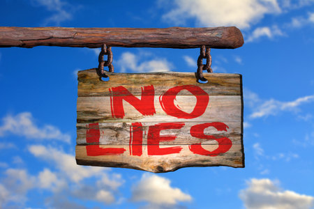 No lies motivational phrase sign on old wood with blurred backgroundの写真素材