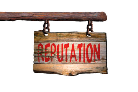 Reputation motivational phrase sign on old wood with white backgroundの写真素材
