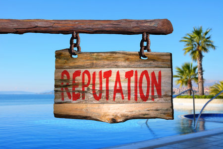 Reputation motivational phrase sign on old wood with blurred backgroundの写真素材