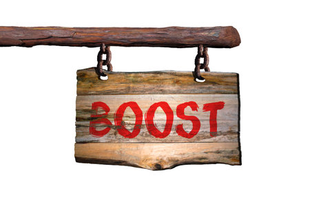 Boost motivational phrase sign on old wood with blurred backgroundの写真素材