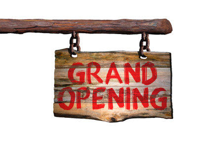 Grand opening motivational phrase sign on old wood with blurred backgroundの写真素材