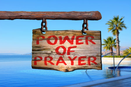 Power of prayer motivational phrase sign on old wood with blurred backgroundの写真素材