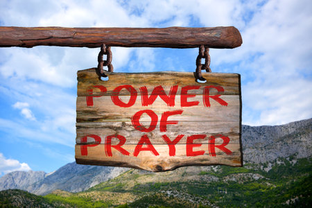 Power of prayer motivational phrase sign on old wood with blurred backgroundの写真素材