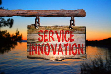 Service innovation motivational phrase sign on old wood with blurred backgroundの写真素材
