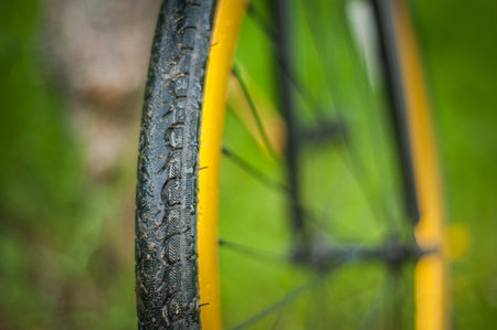 Photo of a Bicycle part, close up. in the open air, the wheel and thread are clearly visible.の写真素材