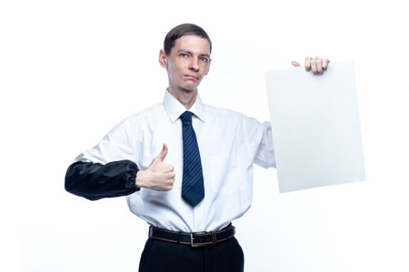 Business man with a piece of paper in his hands on a white, isolated backgroundの写真素材