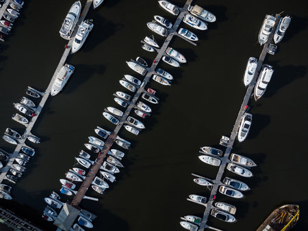 Bird's-eye view of luxury yachts and speedboats in the marina and yacht club.の写真素材