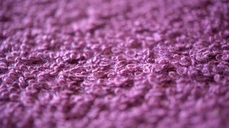 A piece of knitted sweater lilac color. Shooting close-up.の写真素材