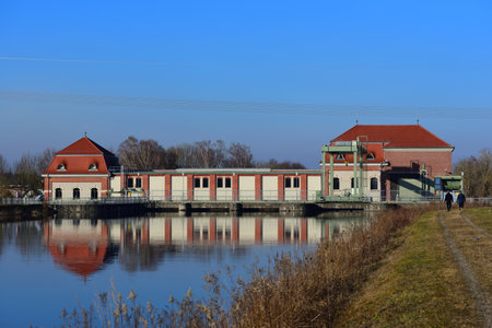 01/01/2020, Atmospheric weather on the Lech Canal near Langweid am Lech with the power generation plant in the center of the picture on New Year's Dayのeditorial素材