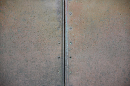 Background divided into two parts made from a copper plate that has been weathered