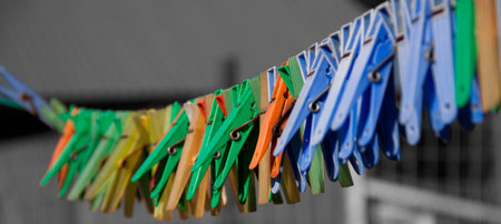 Many different color clothespins. The background is black and white.の写真素材