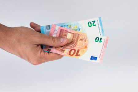 mans hands holding euro money. Concept works for the money