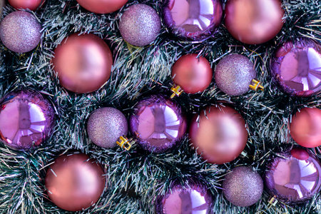 Purple and violet Christmas balls. Christmas background. New Year or Xmas concept. Top view. Close...